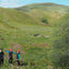 The Mór Card Scotland Canyon Three People and Hills